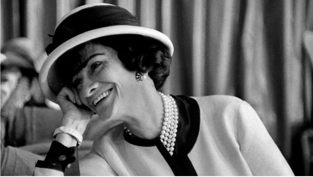 The Fascinating History Of Women's Suits - DSF Antique Jewelry