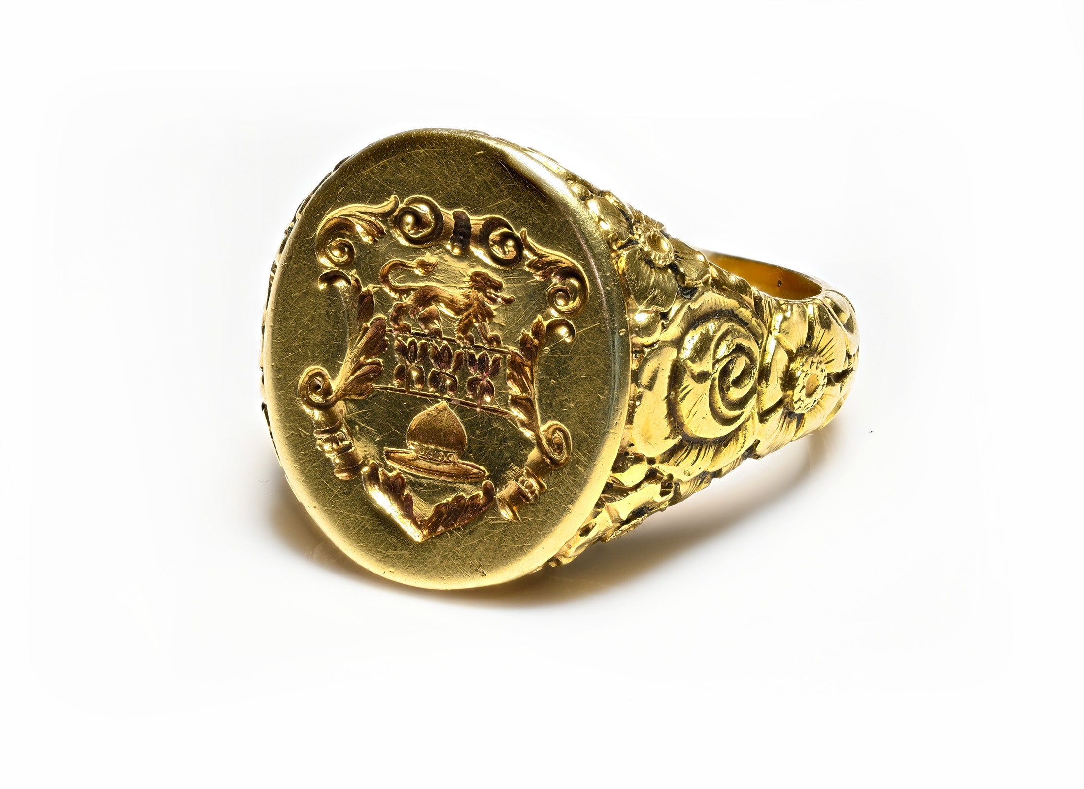 Antique 14K Gold Men's Crest Ring with Carved Floral and Lion Shield Design