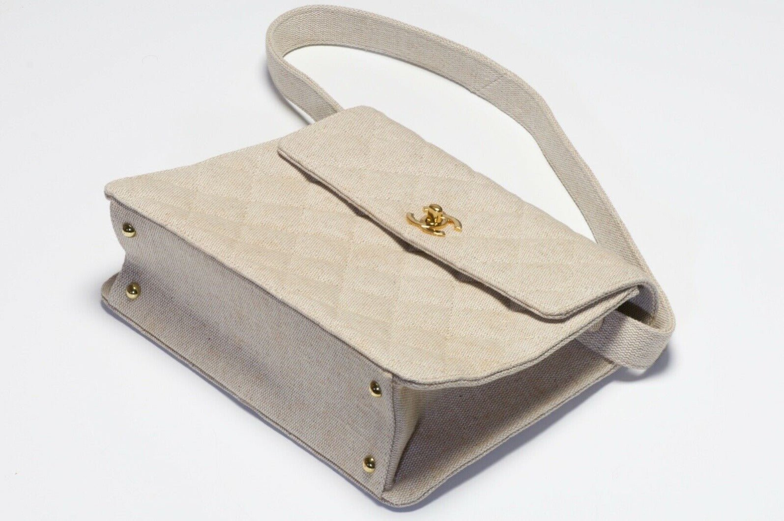 CHANEL Paris 1990’s CC Beige Quilted Canvas Flap Shoulder Bag