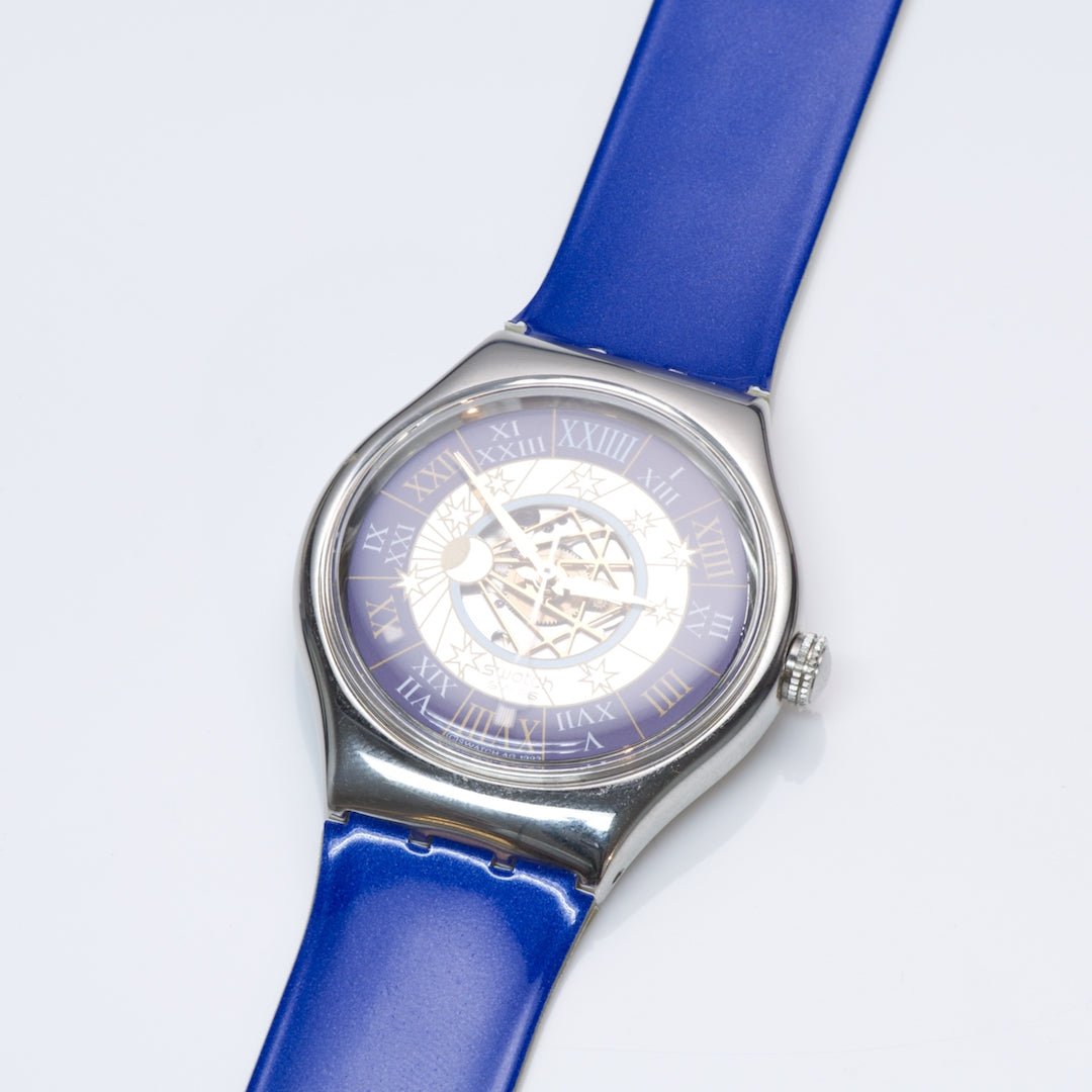 Swatch Tresor Magique Platinum Watch