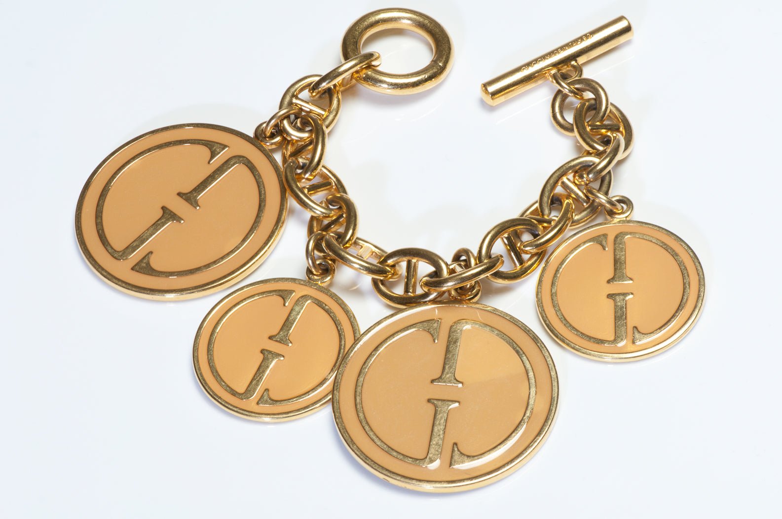 Vintage 1992 Gucci Gold Plated Enamel GG Coin Medallion Charm Bracelet