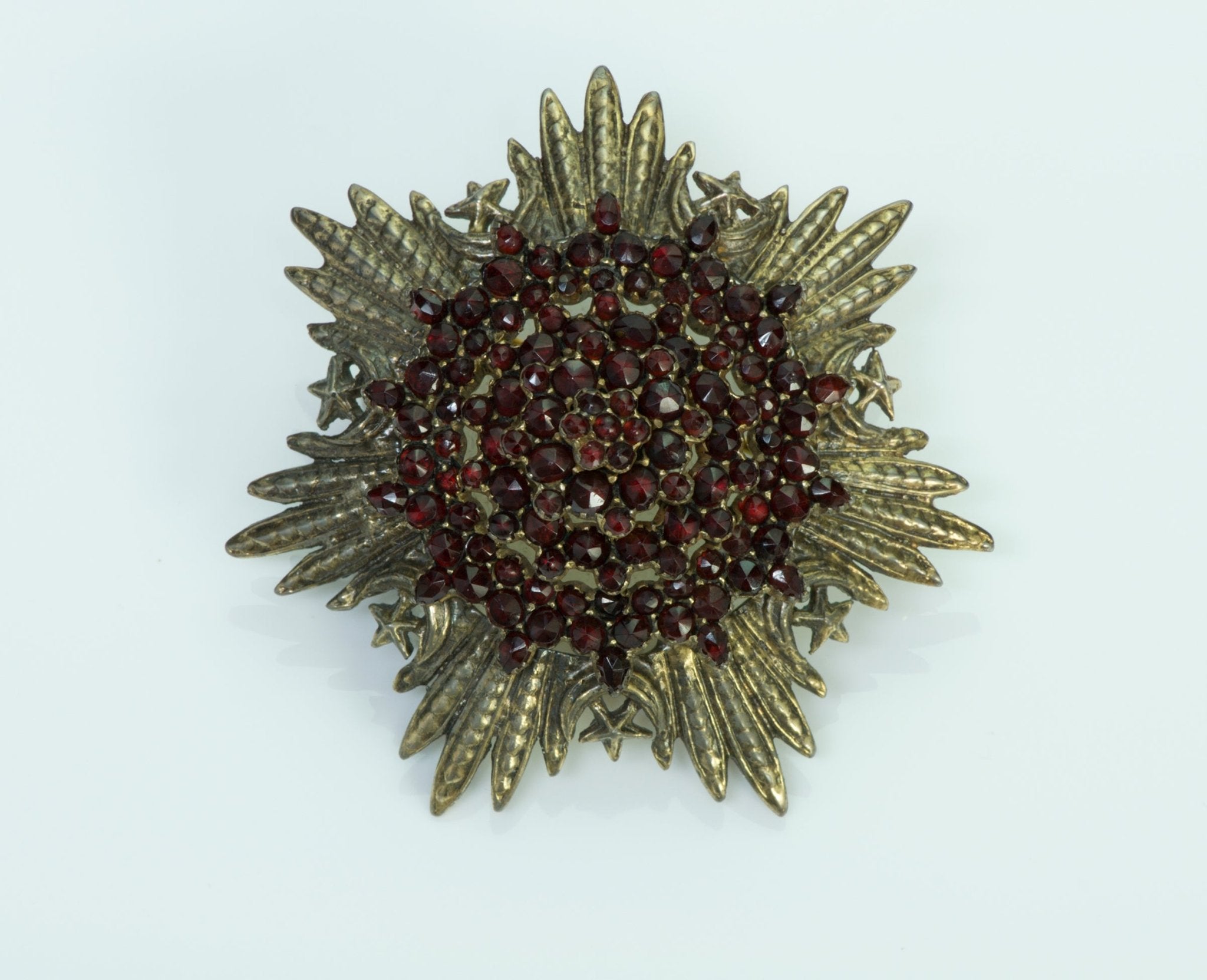 Vintage Seaman Schepps Garnet Silver Starburst Brooch