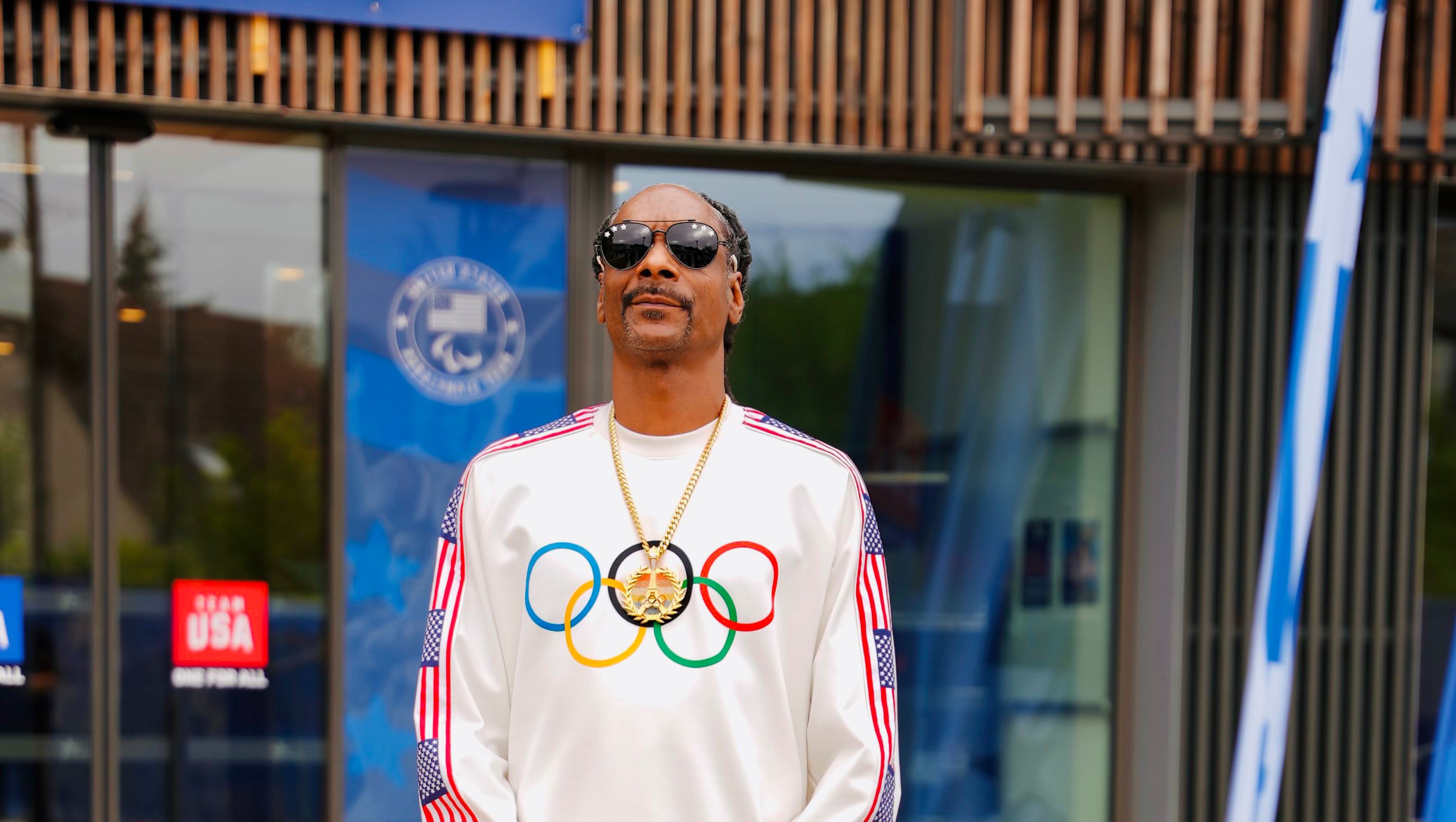 The Summer Olympics: Snoop Dogg Wears Custom "Iced Eiffel Tower" Gold Chain