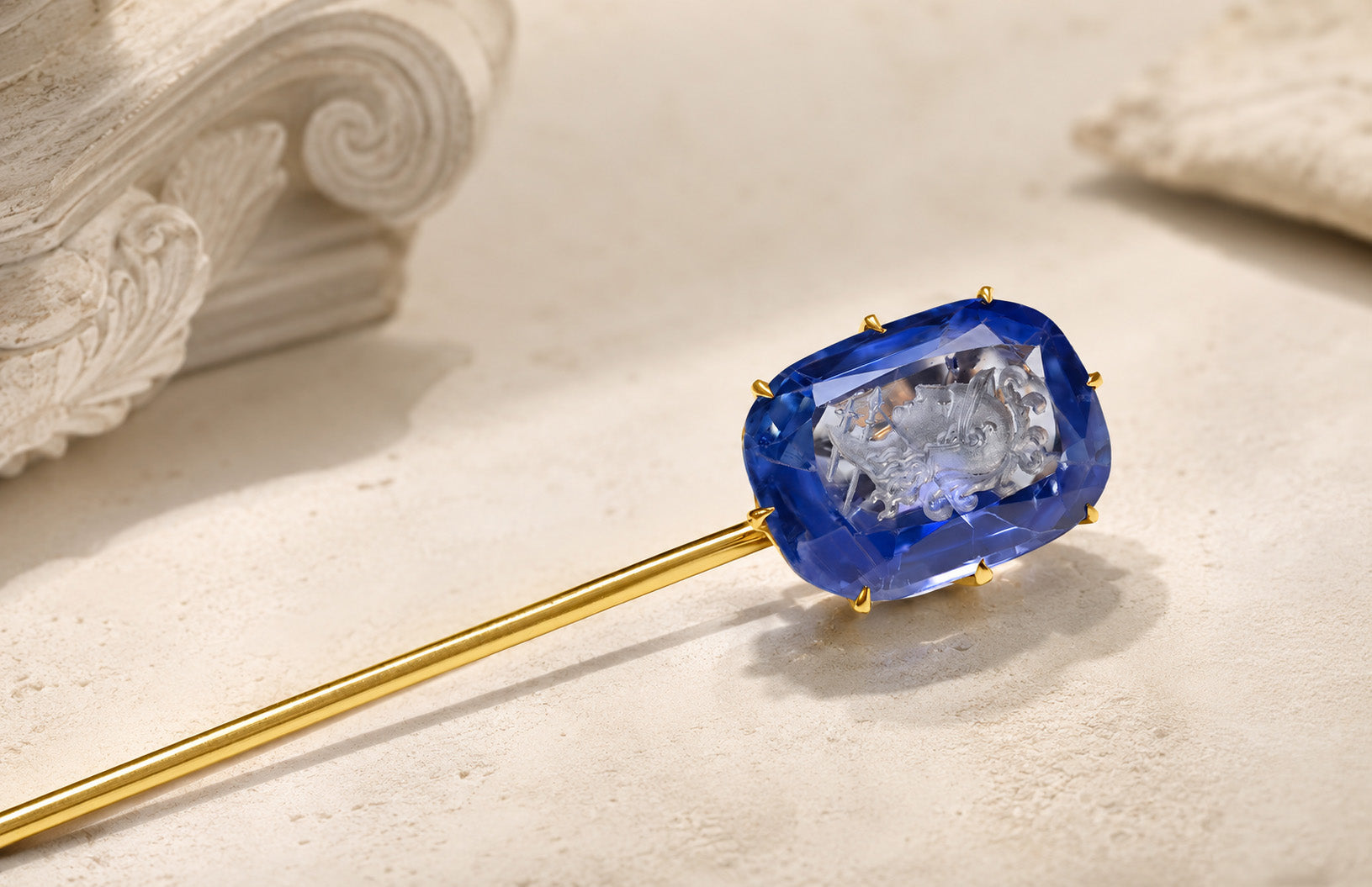 5.20-carat natural unheated Kashmir sapphire intaglio gold stick pin showing a helmeted classical profile