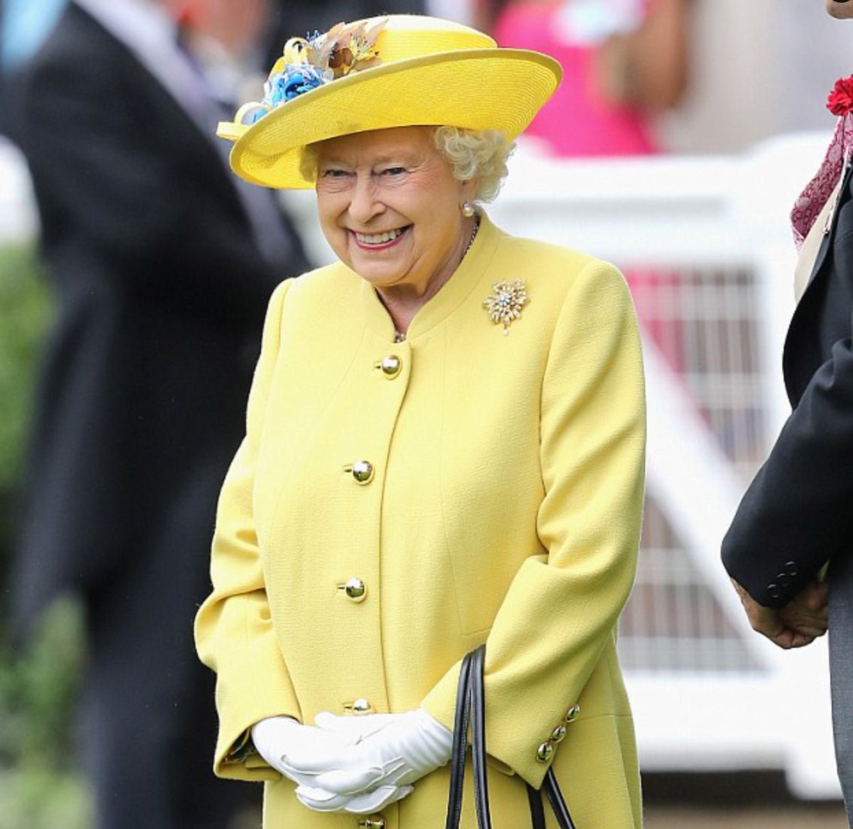Queen Elizabeth Uses Her Handbag To Send Messages To The Secret Service - DSF Antique Jewelry