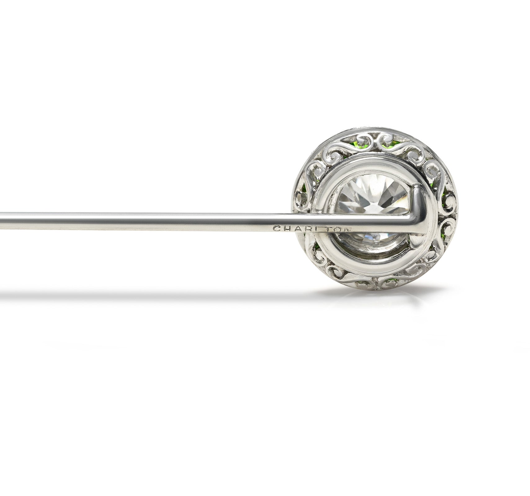 A Rare Art Deco Diamond and Demantoid Garnet Stick Pin by Charlton & Co. 