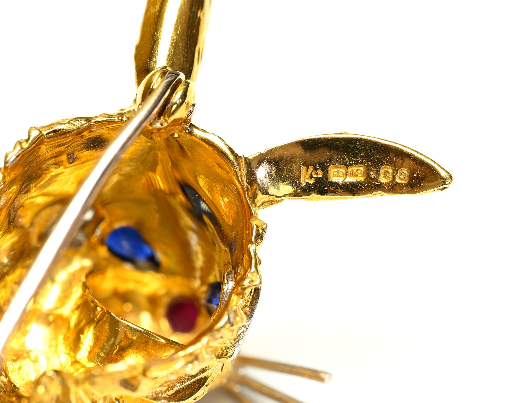 A vintage Kutchinsky 18K Gold Bunny Brooch with Diamonds, Sapphires & Ruby