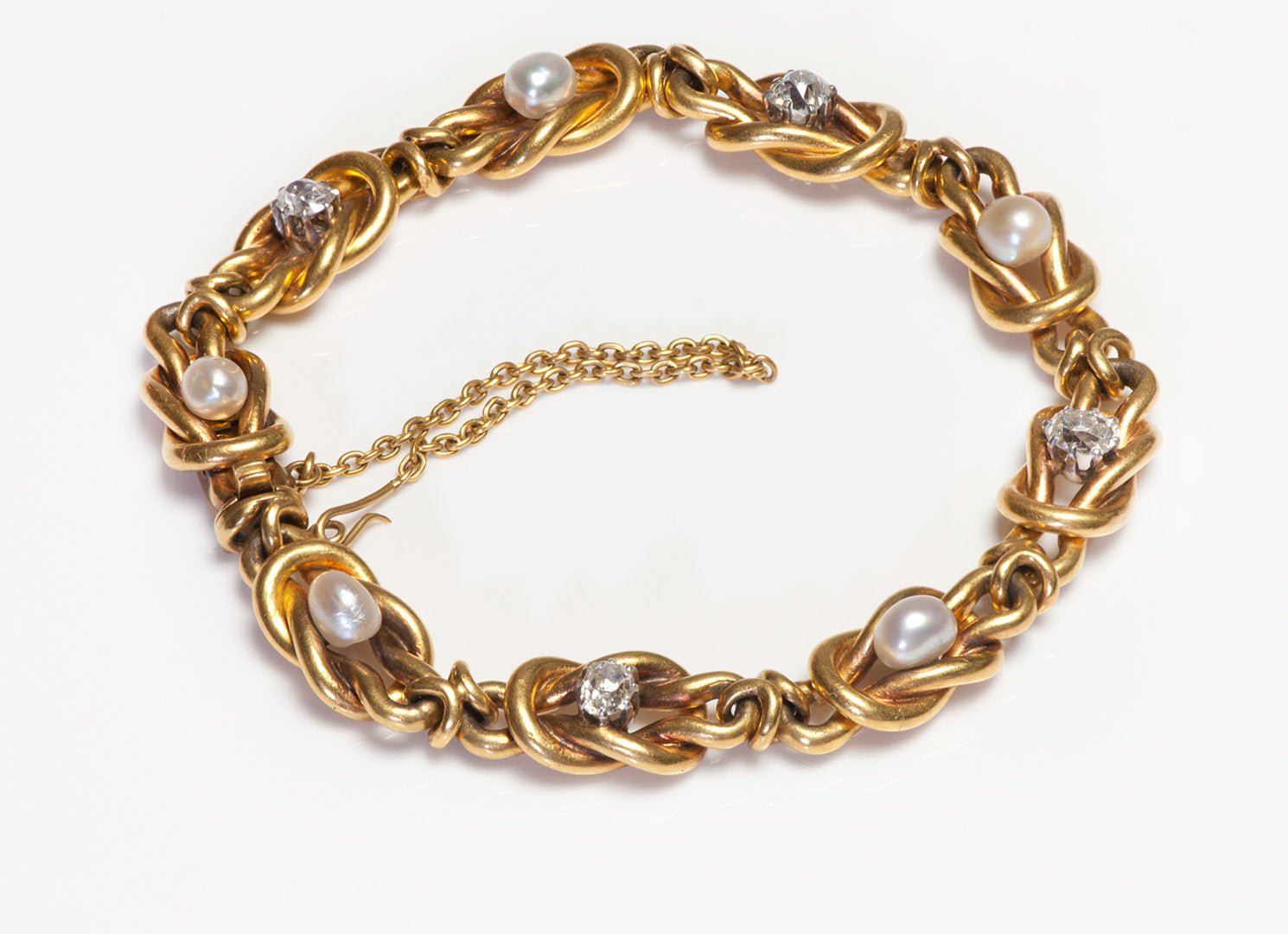 Antique French 18K Gold Old Mine Cut Diamond Pearl Knot Bracelet