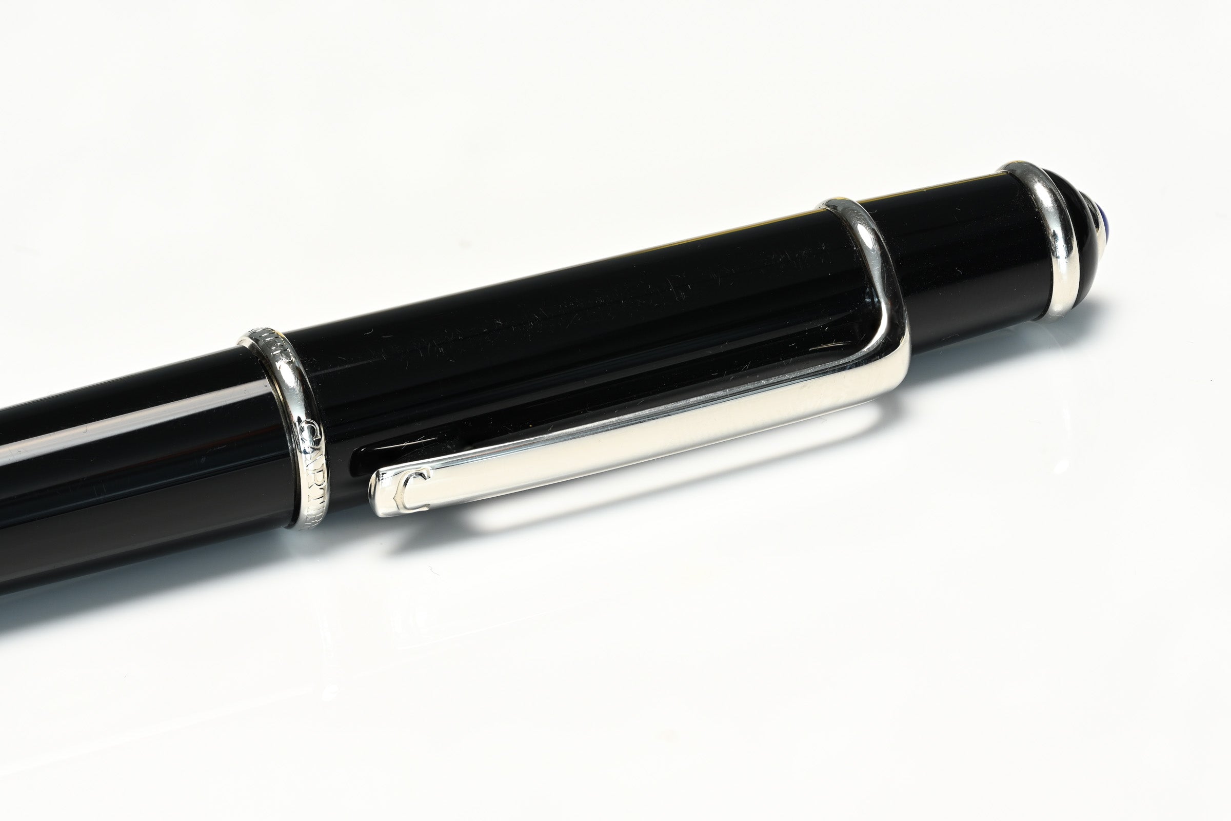 Cartier Black Lacquer Pen with Platinum Finish and Blue Cabochon