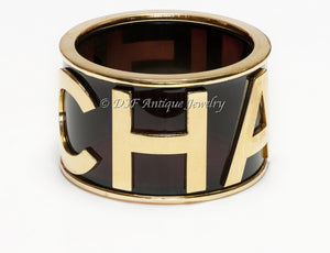 CHANEL Paris 1990’s Brown Lucite Letter Charm Bangle Bracelet