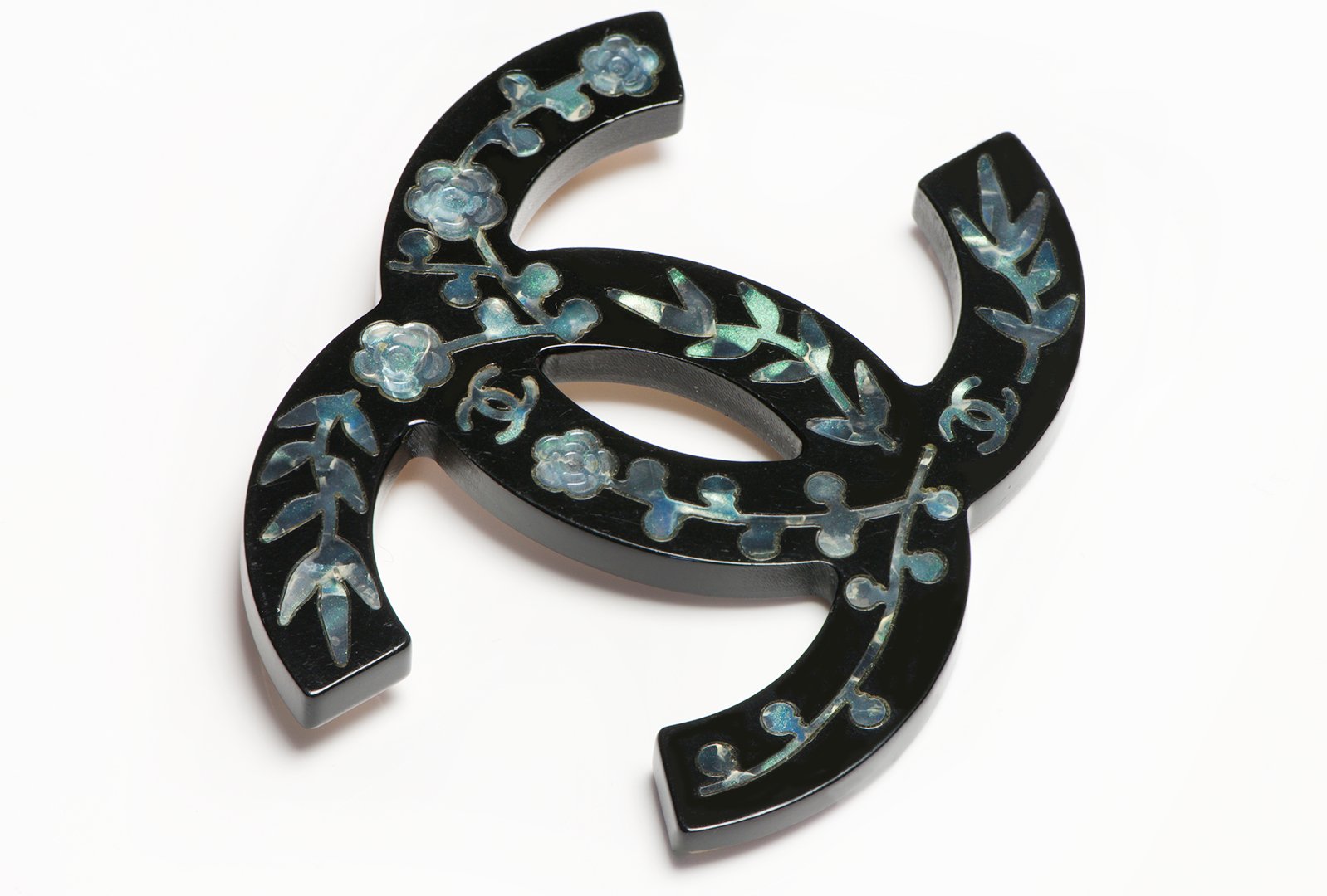 Chanel Paris Fall 2010 CC Black Resin Inlaid Mother of Pearl Camellia Brooch - DSF Antique Jewelry