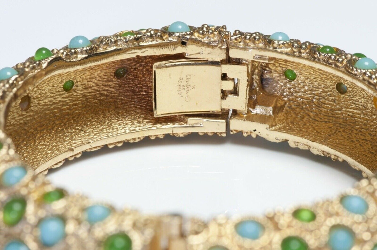 Christian Dior 1968 Henkel & Grosse Green Blue Cabochon Glass Bangle Bracelet - DSF Antique Jewelry
