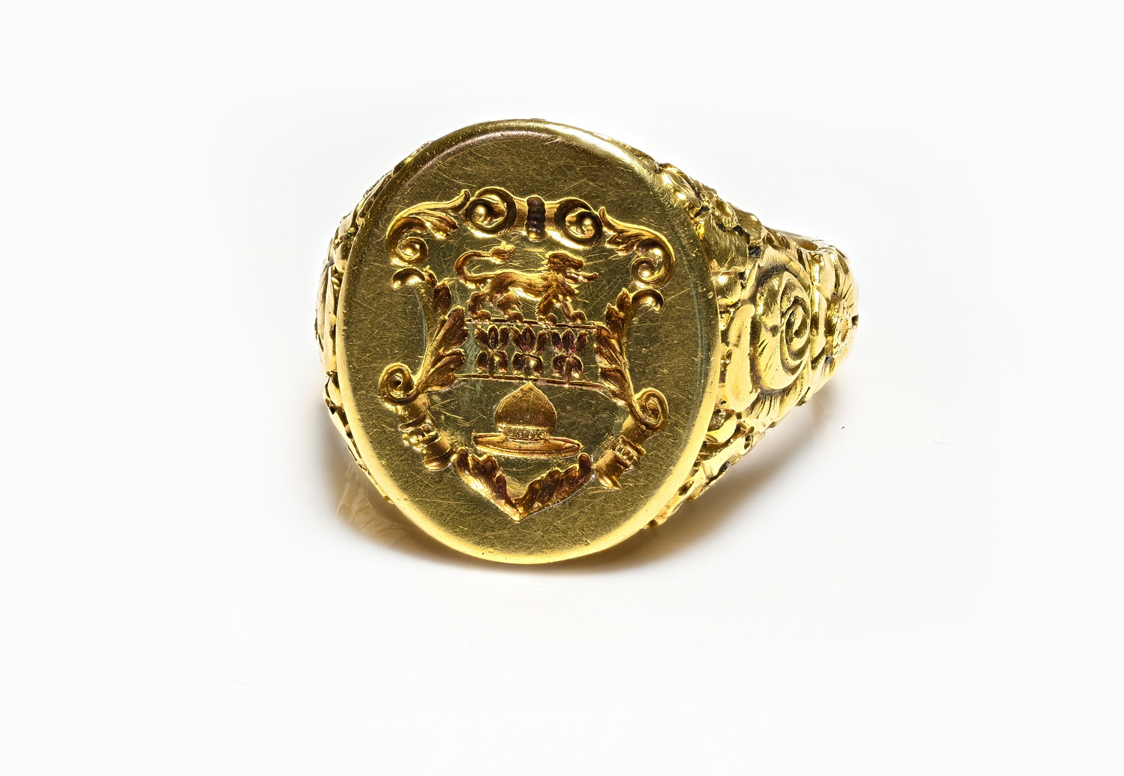 Antique 14K Gold Men's Crest Ring with Carved Floral and Lion Shield Design