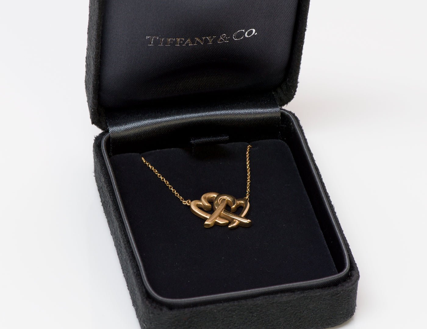 Tiffany & Co. Paloma Picasso 18K Gold Loving Heart Interlocking Pendant