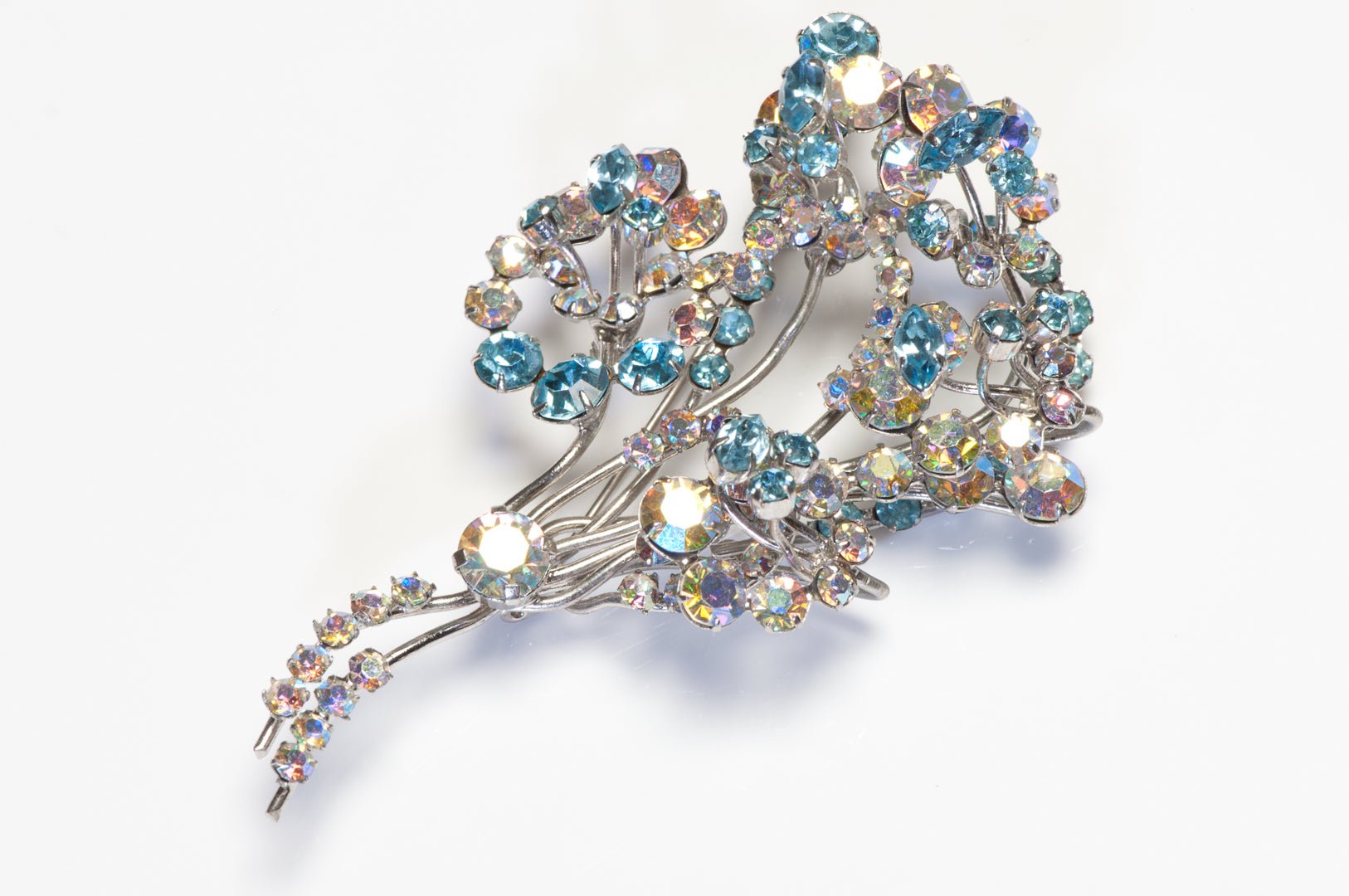 Vintage 1960’s Rhodium Plated Blue Aurora Borealis Crystal Flower Brooch