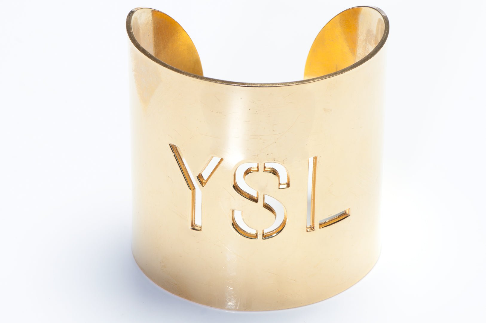 Vintage Yves Saint Laurent Paris YSL Wide Gold Plated Logo Cuff Bracelet